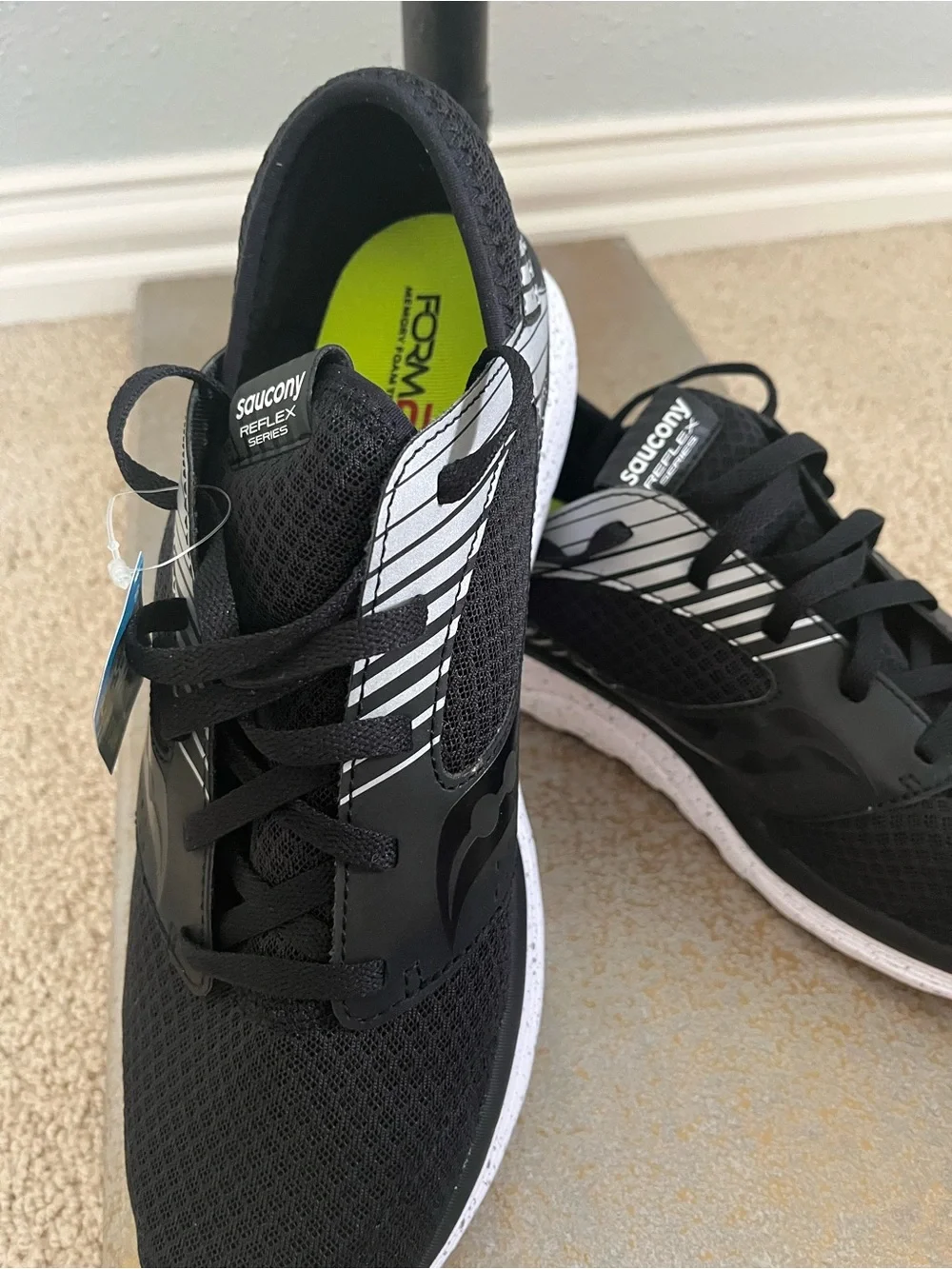 Saucony Men’s Black Athletic Shoes with White Speckled Soles